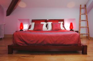 Letto o letti in una camera di Manoir des Chanterelles