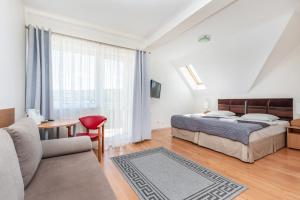 Ένα ή περισσότερα κρεβάτια σε δωμάτιο στο Villa Zdrój