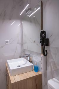 Ένα μπάνιο στο Central Apartment Marianthe