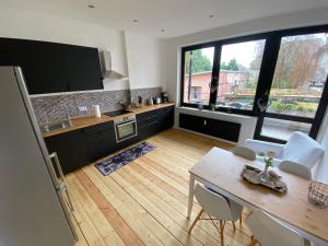Nhà bếp/bếp nhỏ tại Ferienwohnung Brückenkopf EG