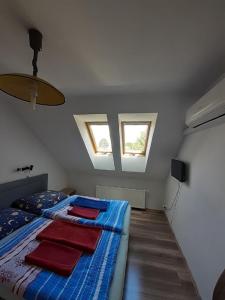 Postel nebo postele na pokoji v ubytování Penzion Fontána