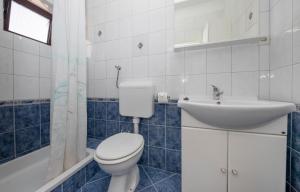 Koupelna v ubytování Apartments Debelić