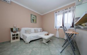Postel nebo postele na pokoji v ubytování Apartments Debelić