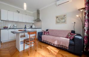 Kuchyň nebo kuchyňský kout v ubytování Apartments Debelić
