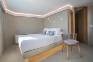 Ένα ή περισσότερα κρεβάτια σε δωμάτιο στο Chic Hotel Santorini