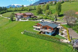 an aerial view of a house on a hill at Chalet Frieda in Mühlbach