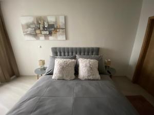 Posteľ alebo postele v izbe v ubytovaní Apartmán Champion