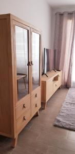 Łóżko lub łóżka w pokoju w obiekcie Apartamento Lujo Duna Beach