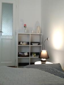 Uma cama ou camas num quarto em Citadela