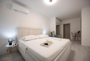 Postel nebo postele na pokoji v ubytování Villa Fidelissima + 37 fotografií