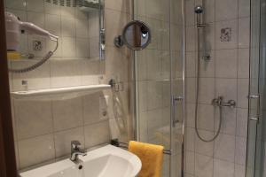 Koupelna v ubytování Hotel Brigitte