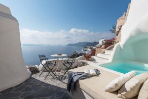 a view of the ocean from a villa with a swimming pool at The sculptor's house by Cycladica in Oia