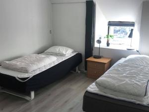 Postel nebo postele na pokoji v ubytování Genner Bygade 22 Feriehus
