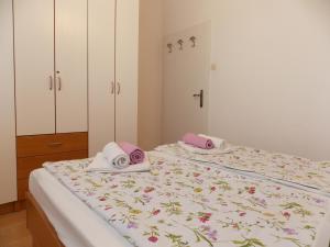 Posteľ alebo postele v izbe v ubytovaní Apartment Sladić