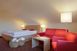 Postel nebo postele na pokoji v ubytování Hotel Konradshof