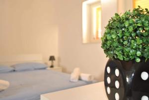 A bed or beds in a room at Masseria Capece bed & breakfast