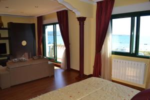 Giường trong phòng chung tại Casa Cotón - Chalet vacacional de playa