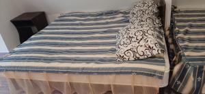 Ліжко або ліжка в номері Комната в мансарде у моря