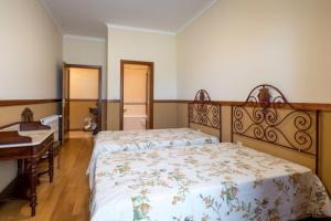 Postel nebo postele na pokoji v ubytování Quinta Sta Luzia Carrascal