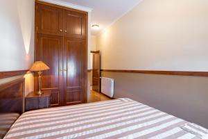 Postel nebo postele na pokoji v ubytování Quinta Sta Luzia Carrascal