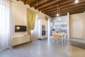 A kitchen or kitchenette at APPARTAMENTO AL CASTELLO