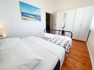 Posteľ alebo postele v izbe v ubytovaní Apartmani Mikulić