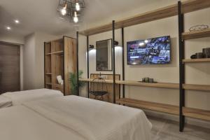 Postel nebo postele na pokoji v ubytování Hotel Hermes Pieria + 37 fotografií