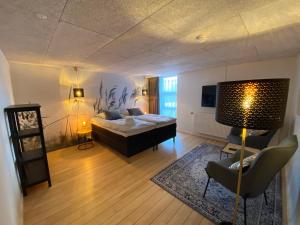 Giường trong phòng chung tại Hotel Sov Godt Herning