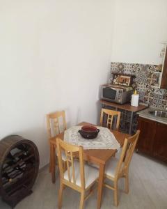 A kitchen or kitchenette at Sweet Home by Giò