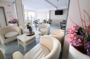 TV a/nebo společenská místnost v ubytování Hotel Bing