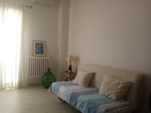A seating area at Sweet Home by Giò