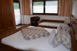Letto o letti in una camera di Gästehaus Wildauer