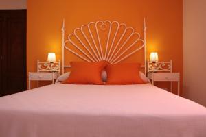 Postel nebo postele na pokoji v ubytování Hotel Las Catedrales