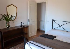 A bed or beds in a room at Villa Vittorio - Splendid panoramic sea view terrace