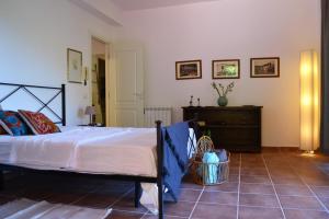 A bed or beds in a room at Villa Vittorio - Splendid panoramic sea view terrace