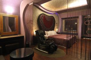 Postel nebo postele na pokoji v ubytování Romantic Code Art Motel