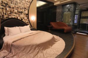 Postel nebo postele na pokoji v ubytování Romantic Code Art Motel