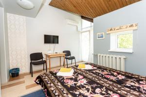 Televiisor ja/või meelelahutuskeskus majutusasutuses Guest House Rannaliiv