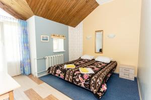Postel nebo postele na pokoji v ubytování Guest House Rannaliiv