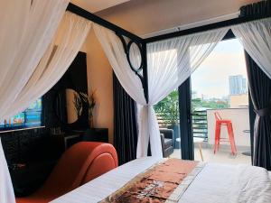 Giường trong phòng chung tại Kha Thy Hotel 2