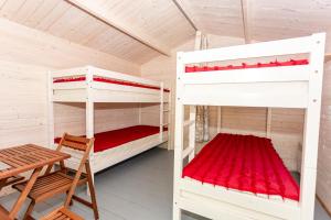 Postel nebo postele na pokoji v ubytování Guest House Rannaliiv