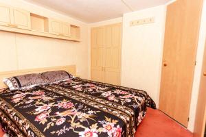 Postel nebo postele na pokoji v ubytování Guest House Rannaliiv