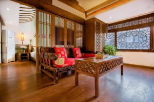 夕露小榭古城南门店 Xilu Xiaoxie Inn Old Town Lijiang的休息区