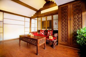 夕露小榭古城南门店 Xilu Xiaoxie Inn Old Town Lijiang的休息区