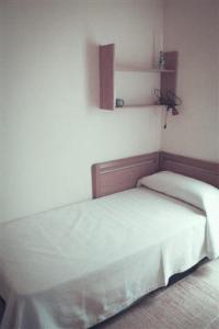 Posteľ alebo postele v izbe v ubytovaní Apartamento Columbretes