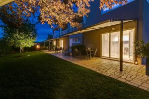 Zahrada ubytování Apartments Dama