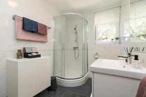 Koupelna v ubytování Apartments Dama