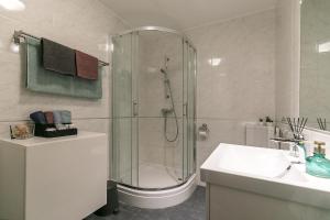 Koupelna v ubytování Apartments Dama