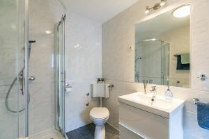 Koupelna v ubytování Apartments Dama