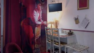 TV a/nebo společenská místnost v ubytování Hotel Mignon